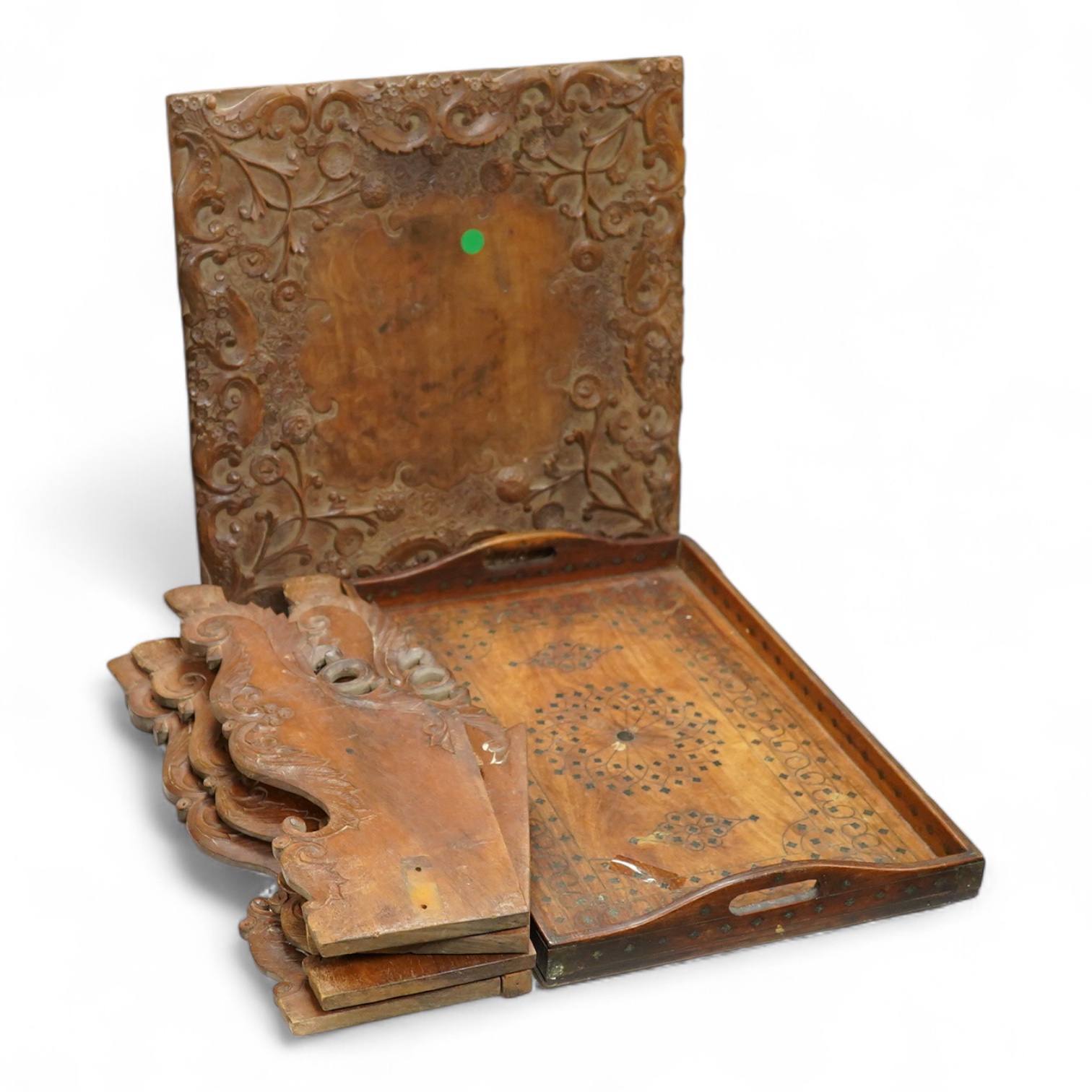 An Indian carved hardwood flat packed table and a similar inlaid tray, 46cm wide